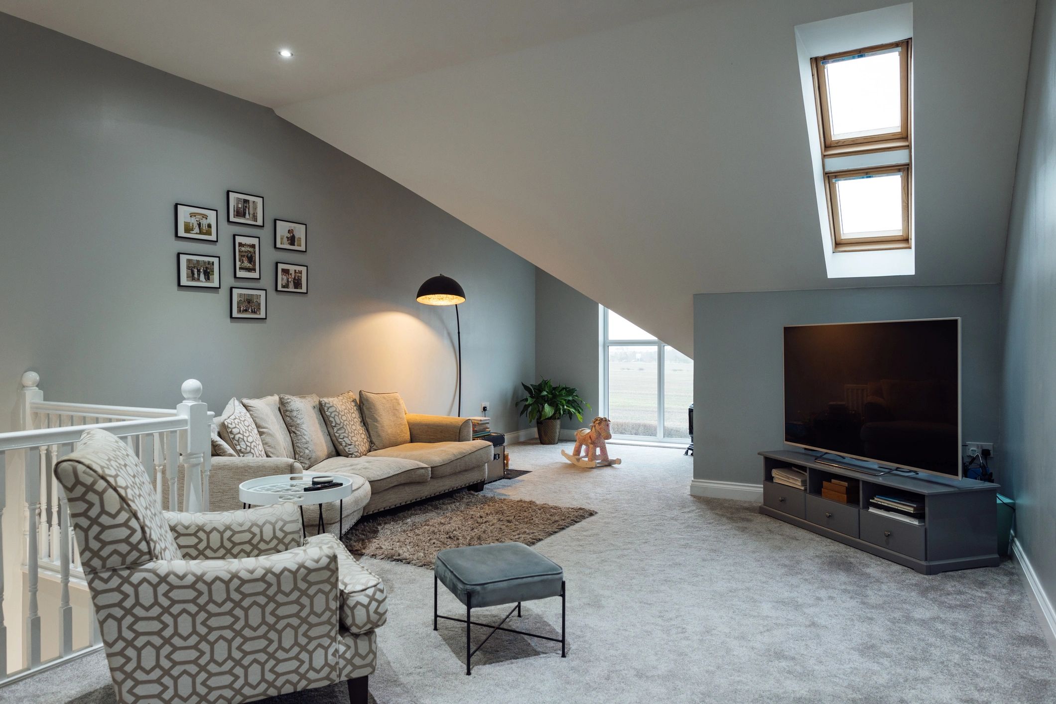 Luxury living room with modern seating and large windows