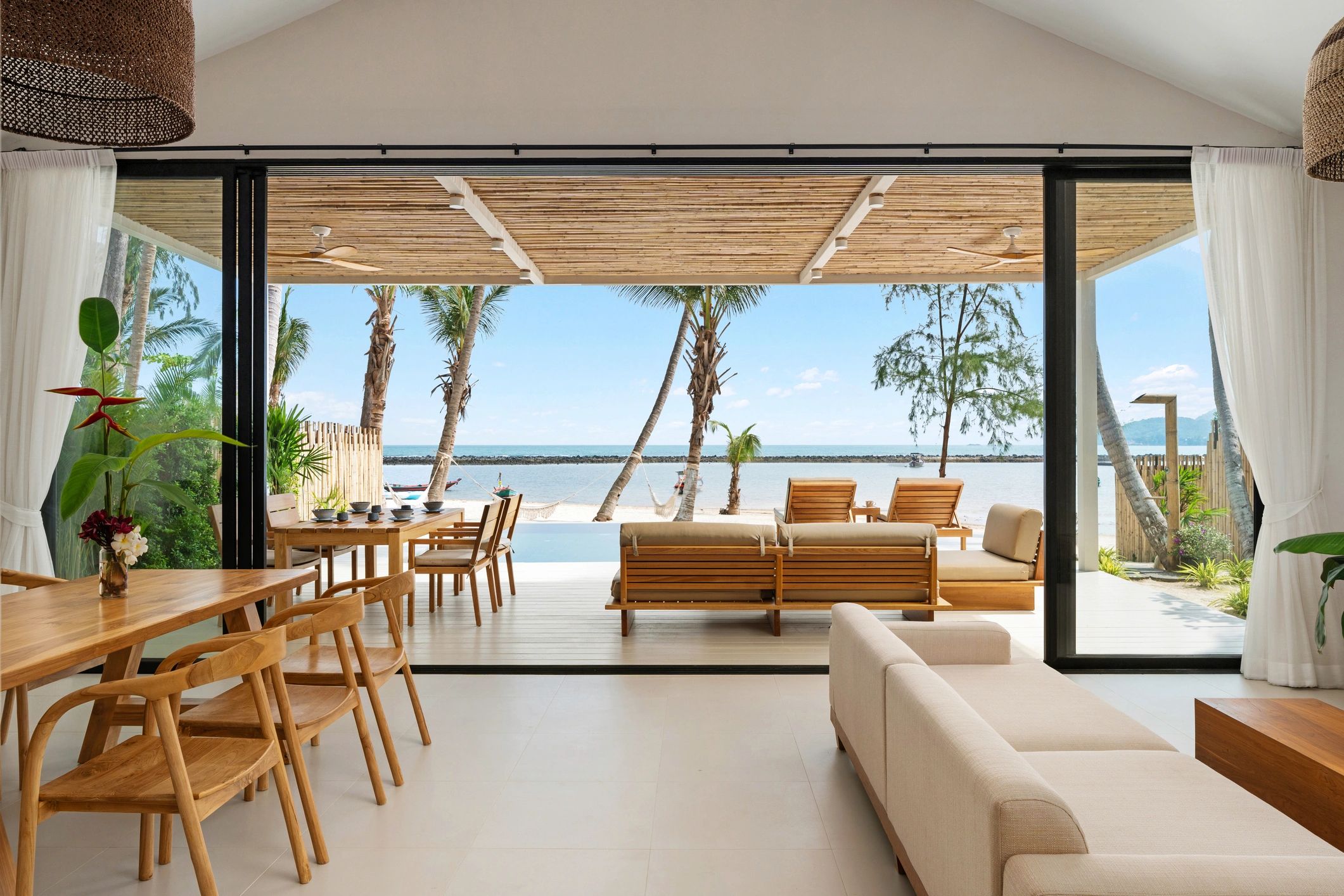 Minimal modern living space with refined furniture and abundant natural light