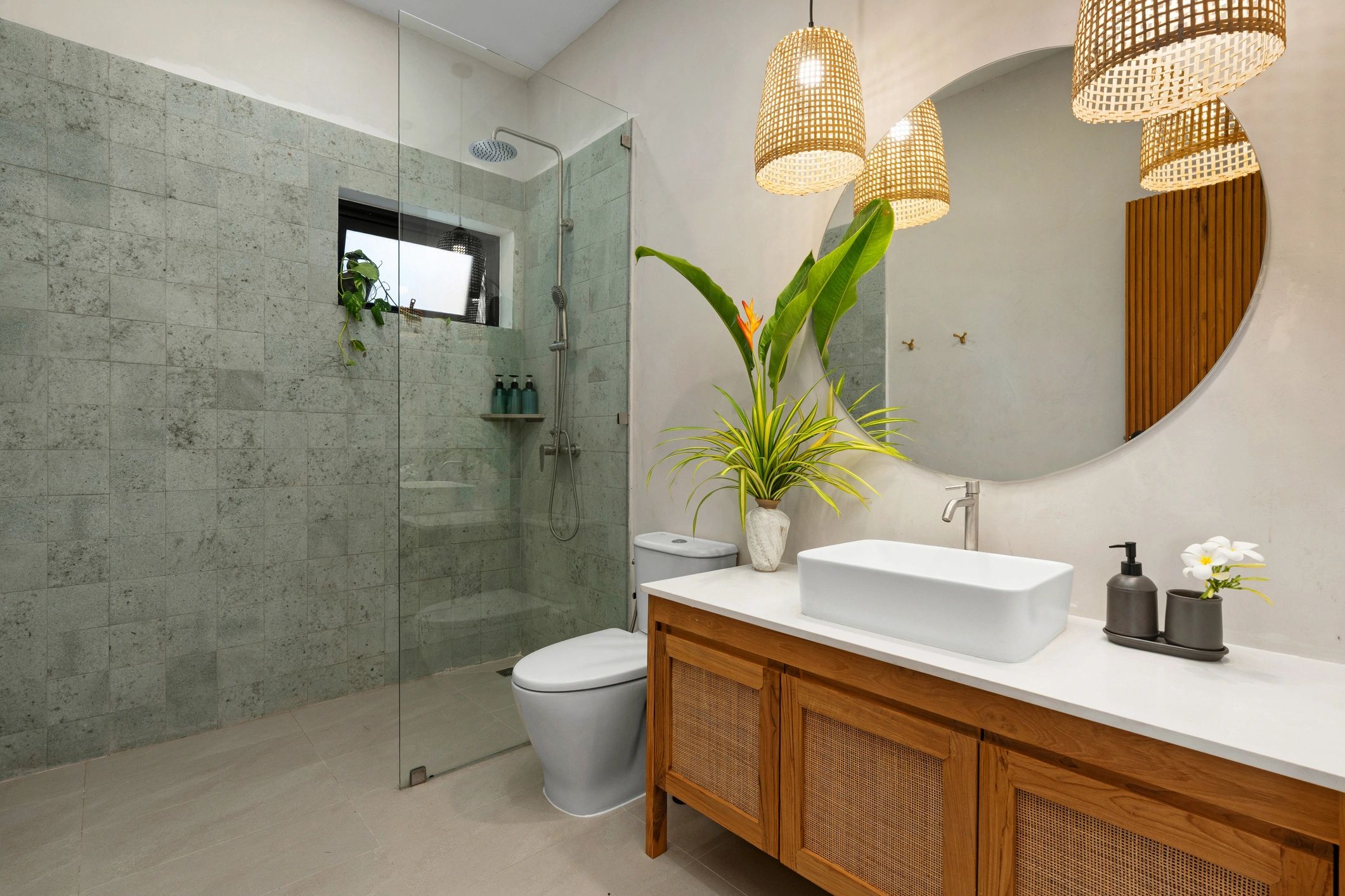 High-end modern bathroom with walk-in shower and warm wood vanity