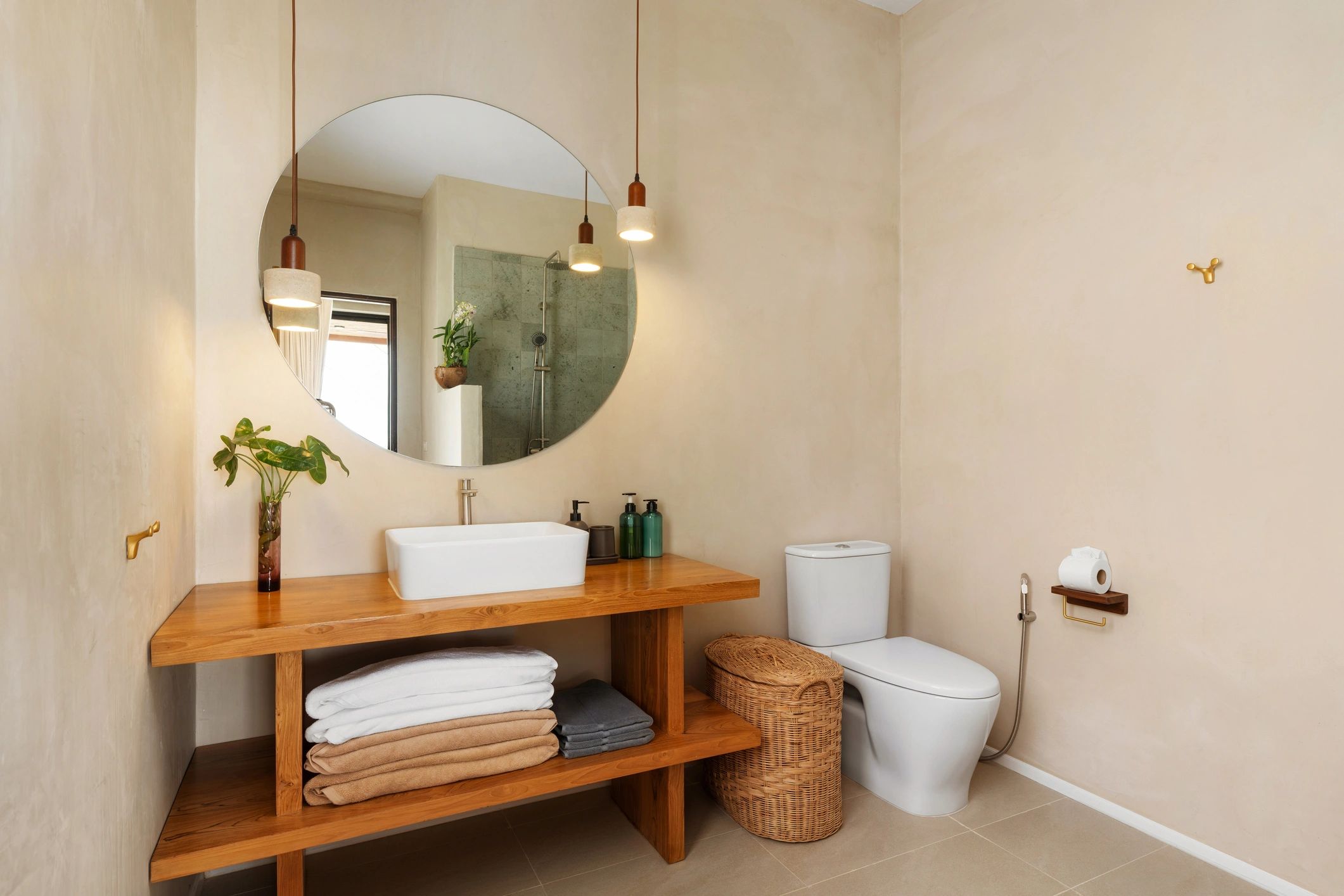Minimalist bathroom with wood vanity and neutral finishes